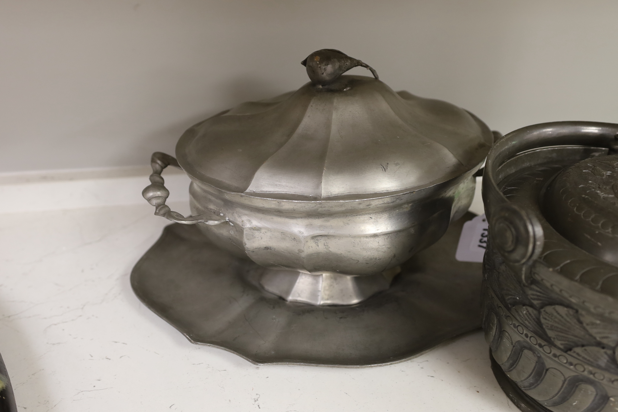 A Belgian? pewter ice bucket and a Kayserzinn tureen, cover and stand